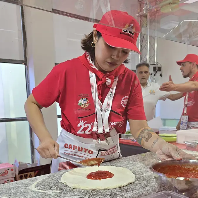 Kasira making Neapolitan pizza
