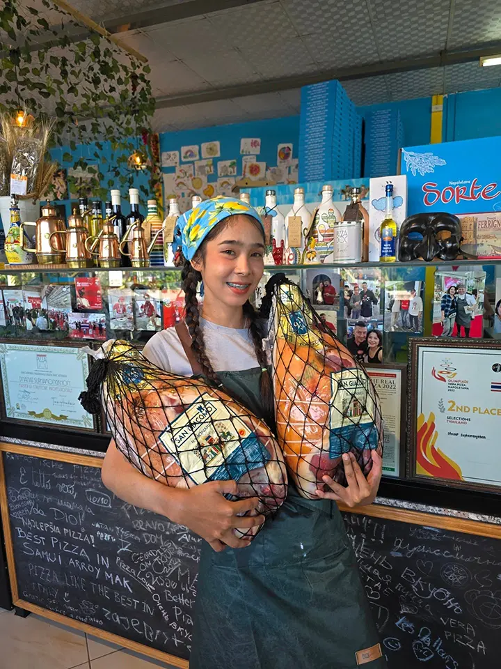 Staff handling Parma ham
